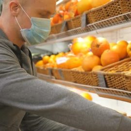 Videohive Man with Medical Face Mask Selects Lemons in Store. Guy Choose Fruits in Supermarket. Purchase Food (Stock Footage) Free Download